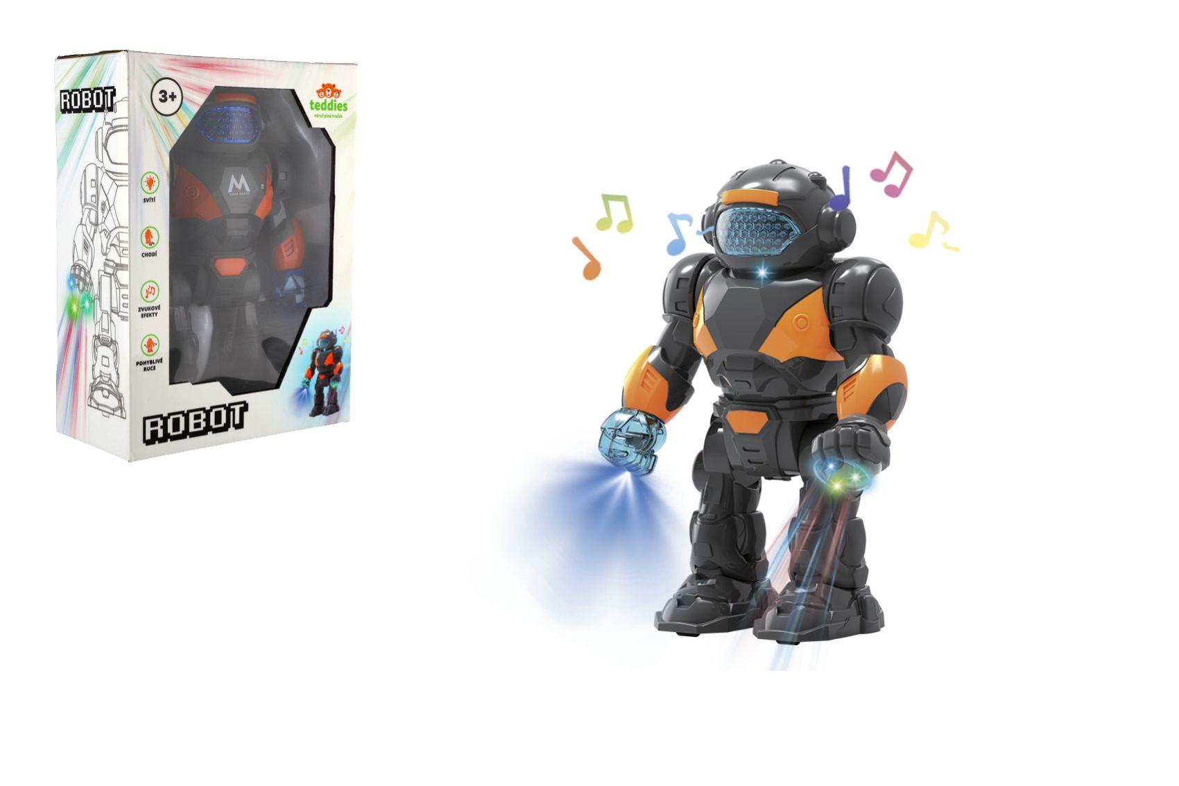 Robot chodící plast 22cm na baterie se světlem se zvukem v krabici 18x24,5x9cm